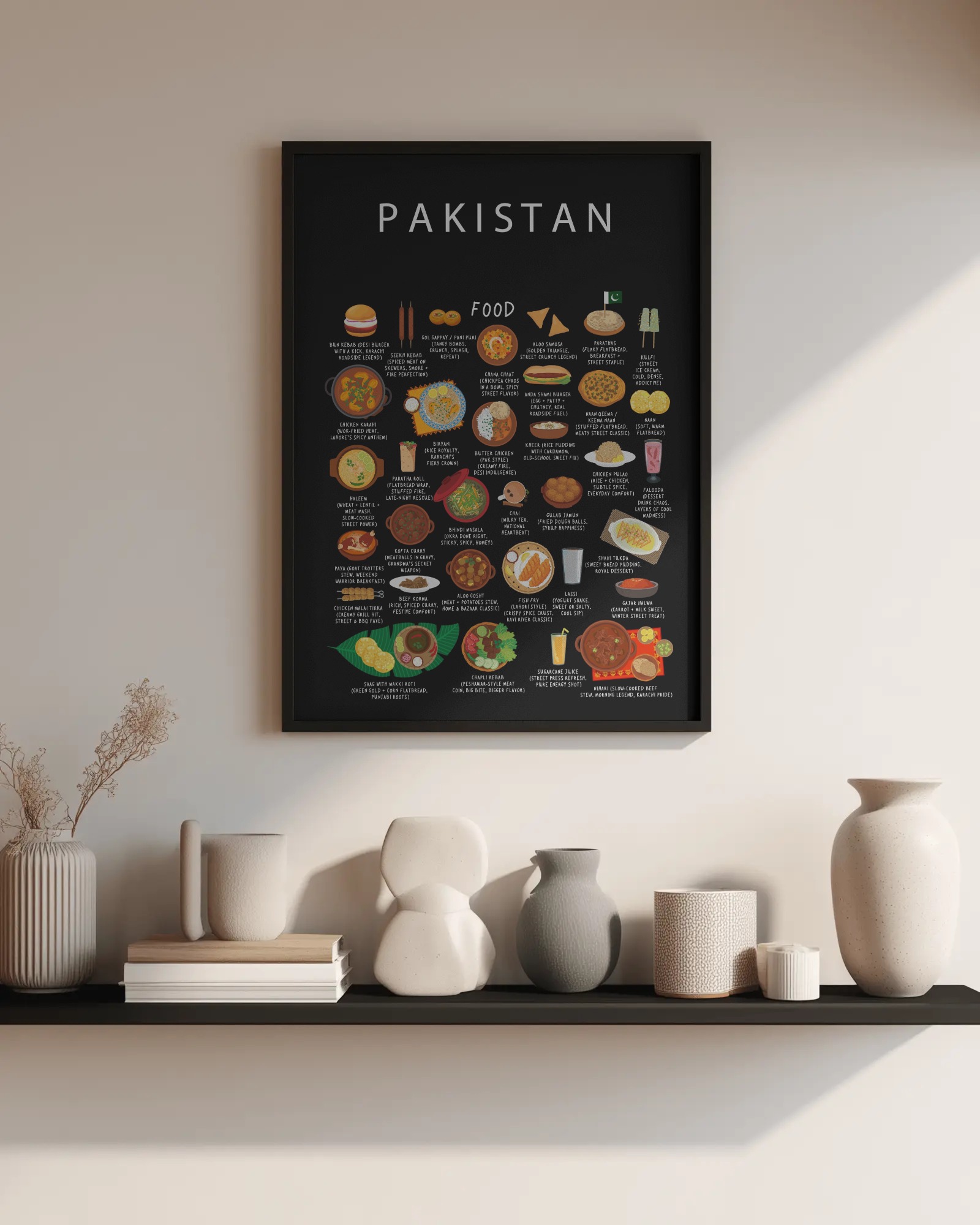 Framed black Pakistan food poster above a shelf of pale ceramic vases