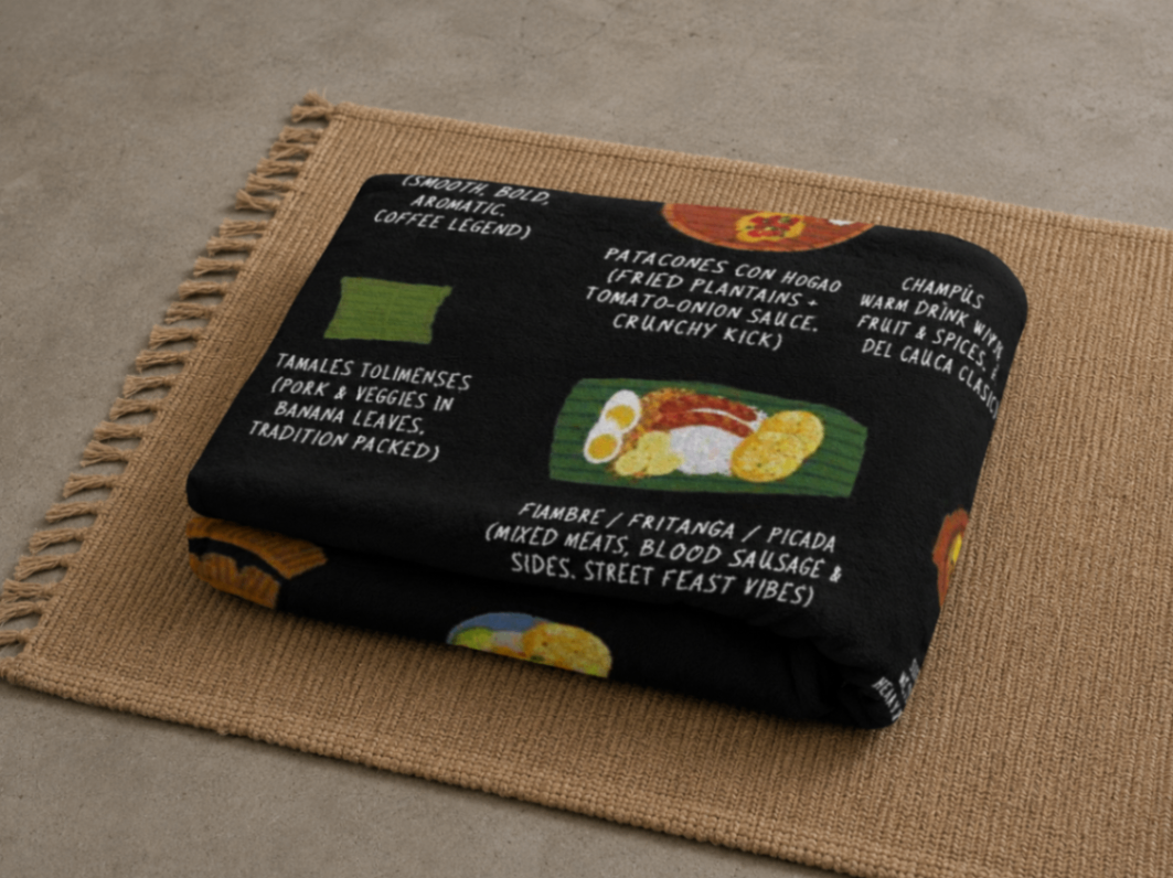 Folded Colombia food blanket resting on a jute mat in warm daylight