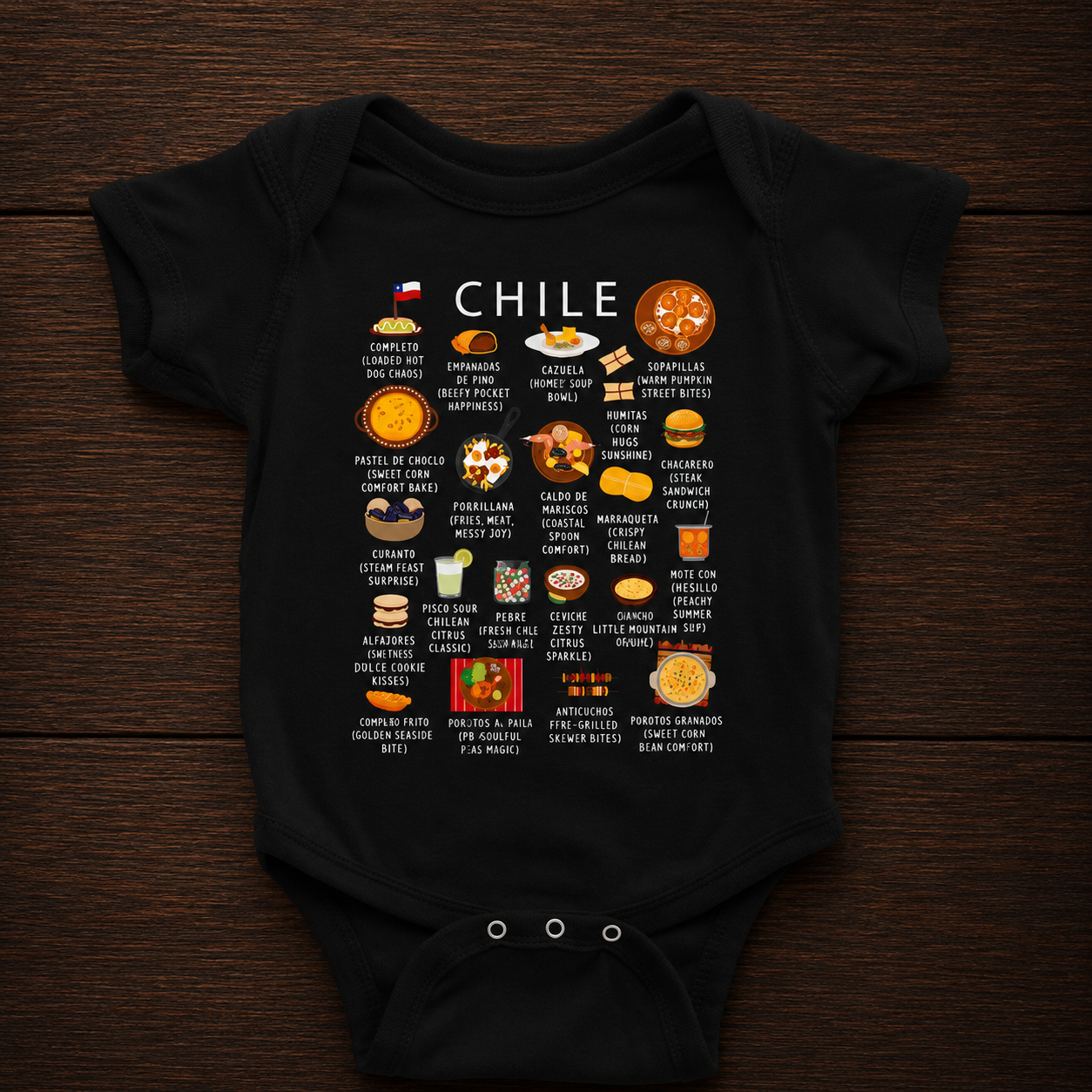 Black Chile food baby onesie styled on a dark wooden surface