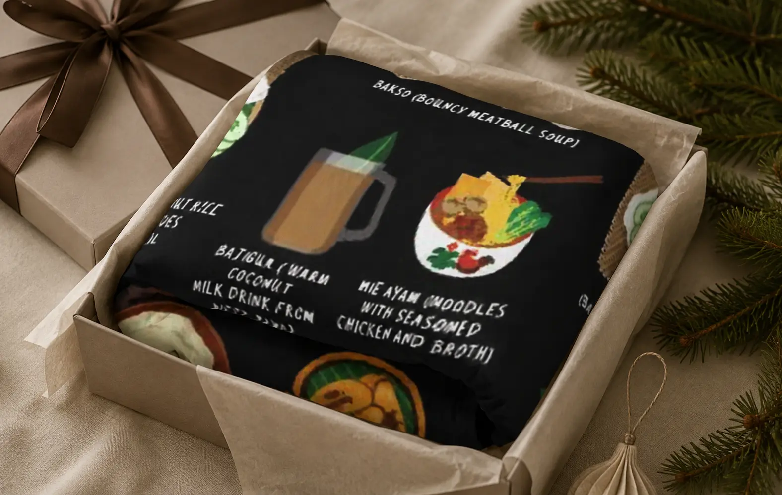 Black Indonesia food blanket folded in a gift box beside pine branches
