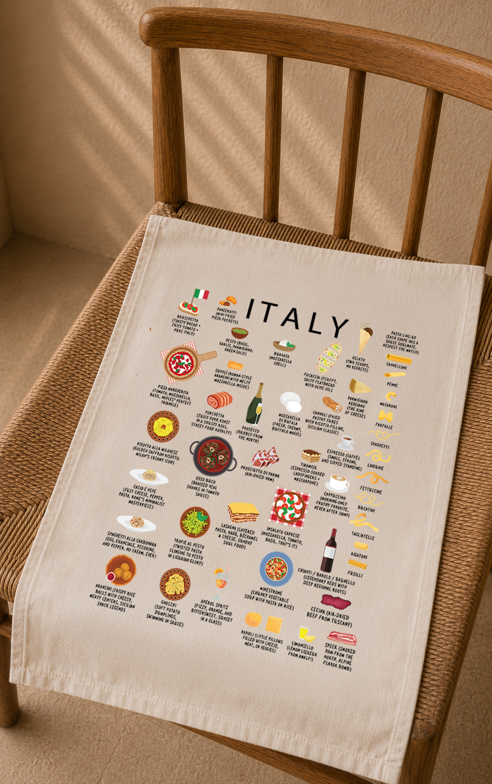 Italy food tea towel draped across a warm wooden chair