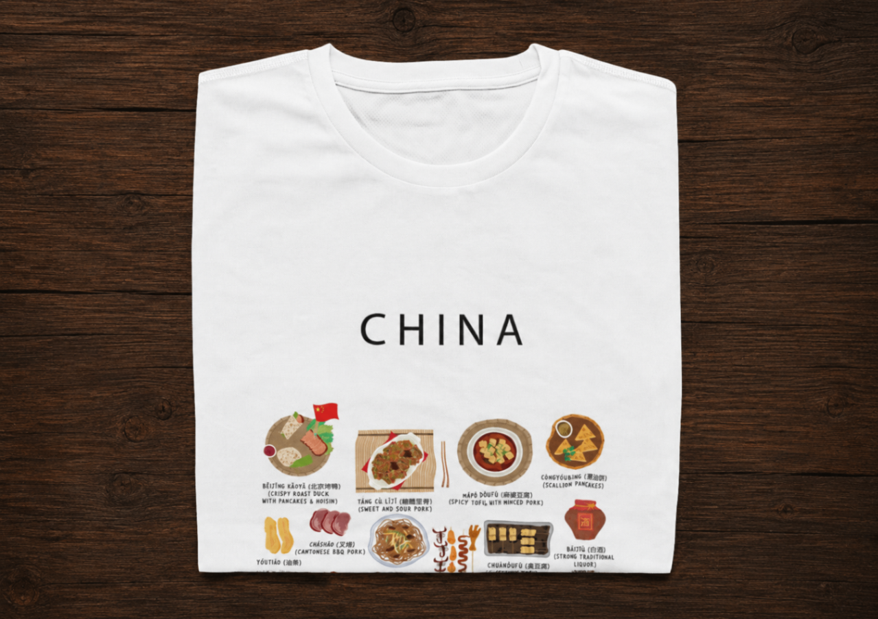 White China food t-shirt folded on a dark wooden surface with Chinese dishes illustrations