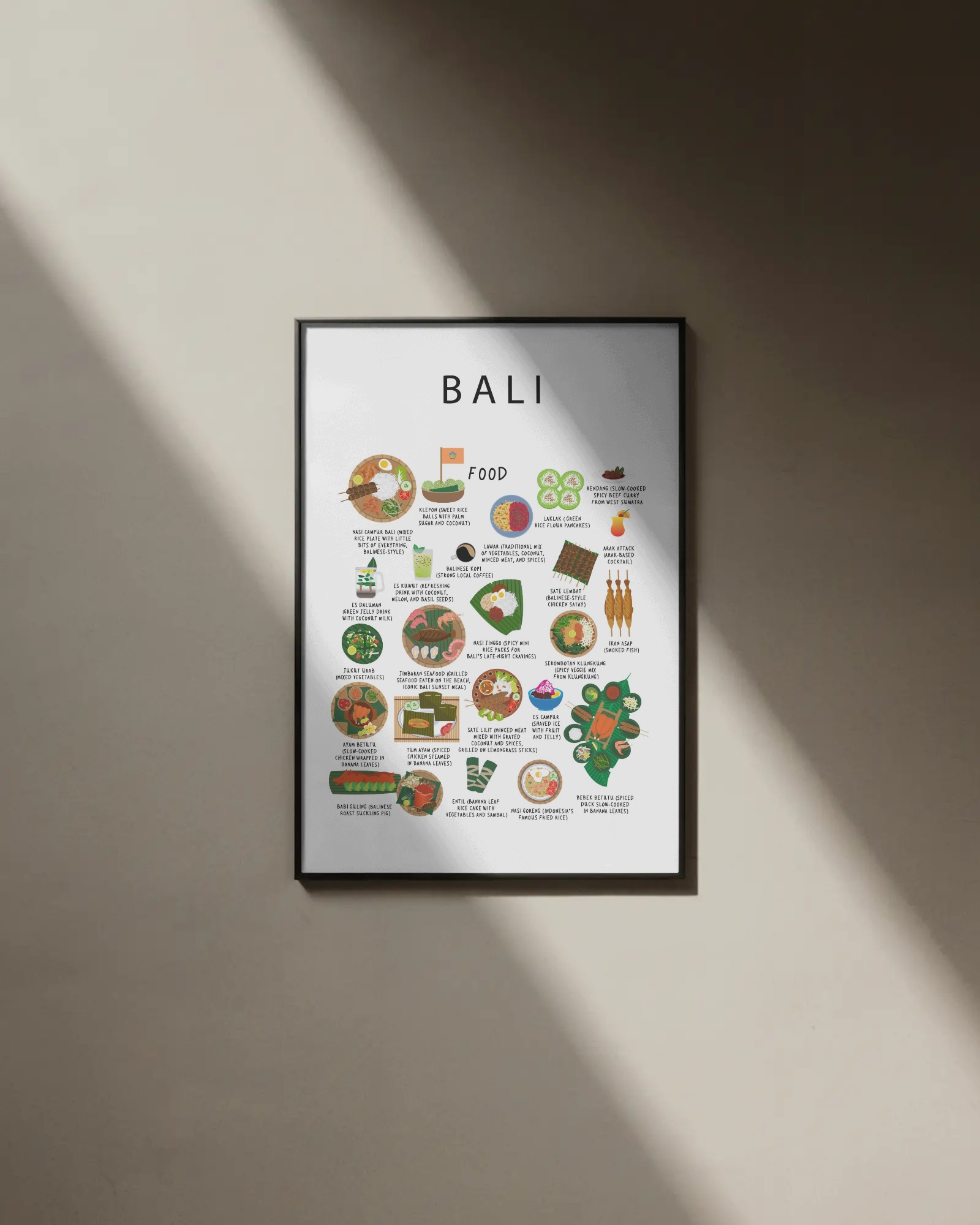 White Bali food poster in a black frame on a sunlit neutral wall