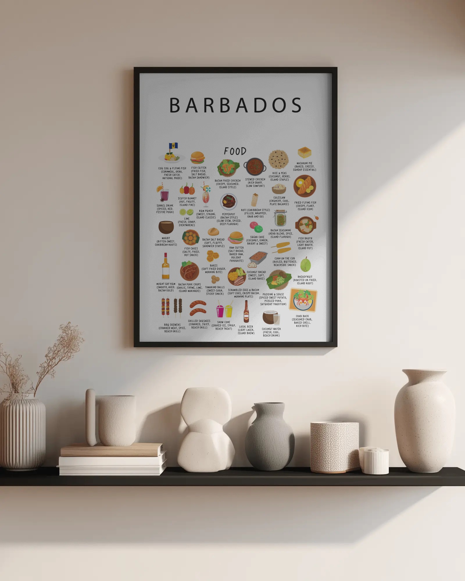 White Barbados food poster framed in black on a soft neutral wall above ceramic vases